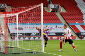 Sheffield United keeper Aaron Ramsdale is beaten by Raul Jimenez’s volley.