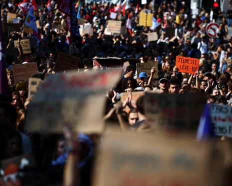 French high school and university students attend a demonstration in Marseille, France.