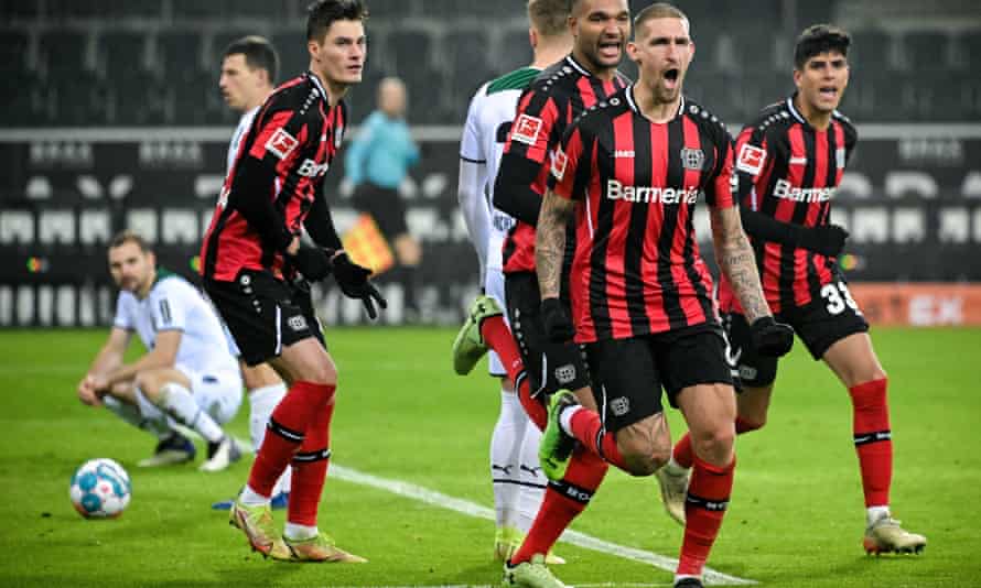 Leverkusen’s Robert Andrich celebrates after scoring from the corner that followed Sommer’s first penalty save.