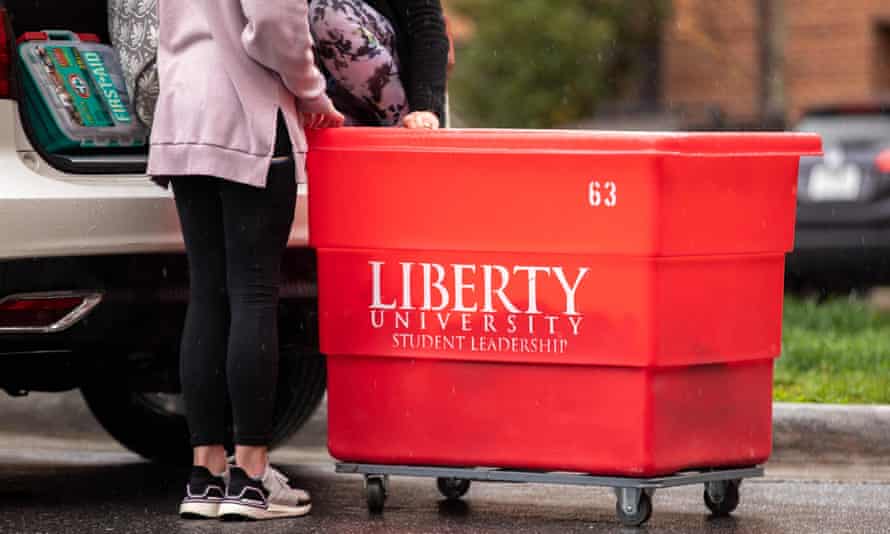 A pupil moves retired of her dorm successful March 2020.