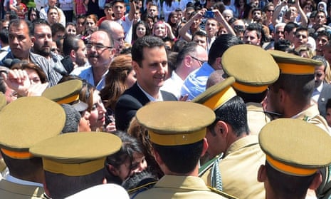 President Bashar al-Assad during an appearance at a school in the capital Damascus on Syria’s Martyrs Day