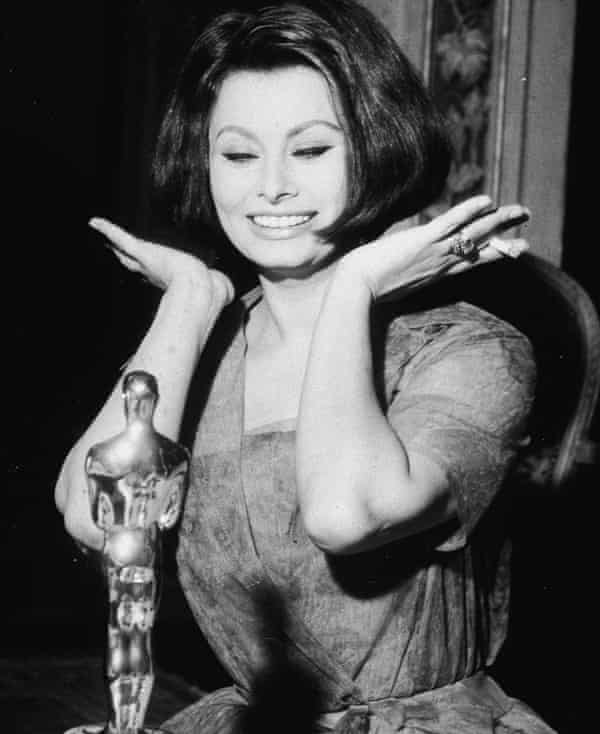 Sophia Loren with the best actress Oscar she won in 1962