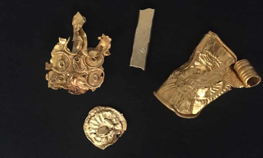 Gold bracteate, gold bar and two more artifacts intended for jewelery fragments
