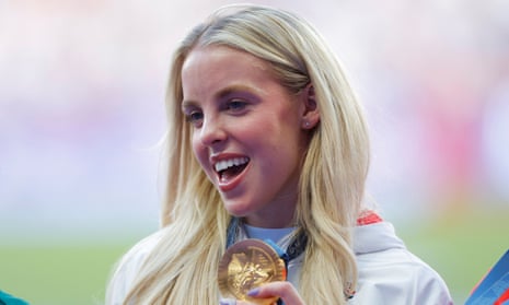 Keely Hodgkinson shows off one of Team GB’s 14 gold medals after winning the women’s 800m