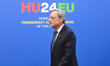 Mario Draghi against a backdrop that reads ‘HU24EU’ in the red, white and green colours of the Hungarian flag