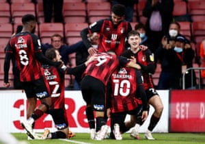 Danjuma and his Bournemouth team-mates celebrate.