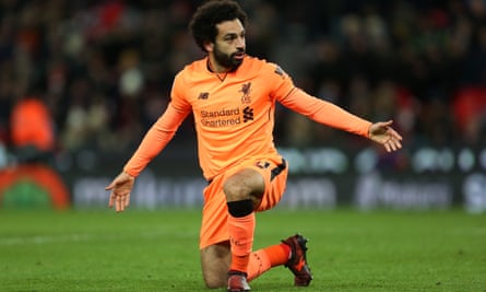 Mohamed Salah celebrates the first of his two goals in Liverpool’s 3-0 win at Stoke
