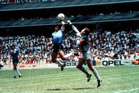 Maradona punches the ball over Shilton to score Argentina’s first