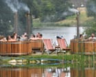 Hot tubs and £80 rosé: how the mud-soaked British festival got a luxury makeover