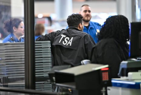 TSA agents at a checkpoint