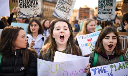 Schoolchildren take part in a nationwide student climate march in in Glasgow in 2019.