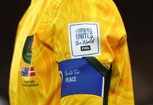 Messages of peace displayed on the shirt and captain’s armband of Australia’s Steph Catley.