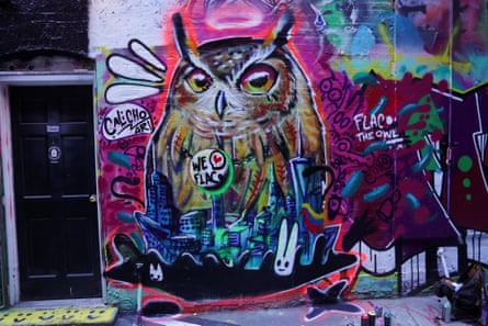 Street art mural honoring Flaco in New York’s Freemans Alley
