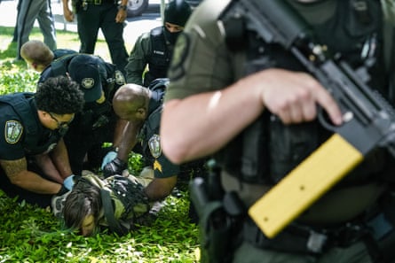 Police detain a demonstrator during a protest against the war in Gaza at Emory University in Georgia on Thursday.