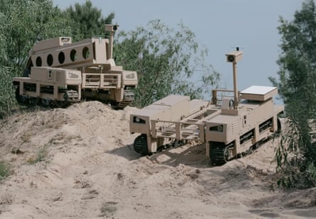 military vehicles on sandy ground
