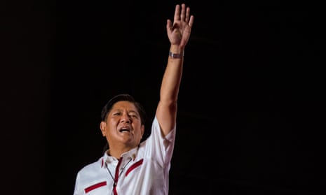 Ferdinand ‘Bongbong’ Marcos Jr. waves to supporters during his last campaign rally before the election in the Philippines