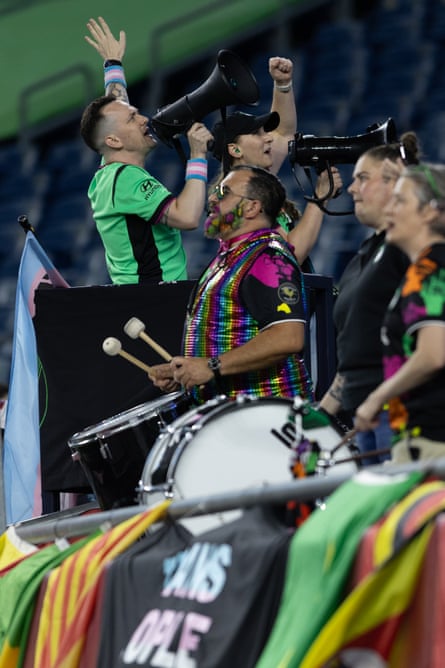 A Boston Legacy supporter holding a bullhorn leads a chant during a match last month against Angel City.