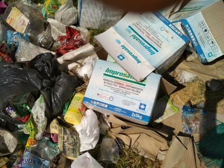 Pesticide containers among other items of rubbish