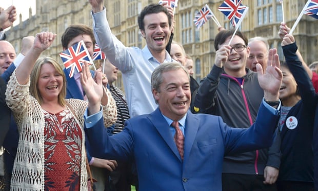 Nigel Farage celebrates the leave victory on College Green in Westminster.