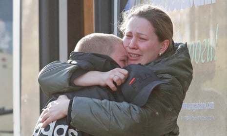 Azovstal steel plant employee Valeria, last name withheld, evacuated from Mariupol, hugs her son Matvey, who had earlier left the city with his relatives, as they meet at a temporary accommodation centre in the village of Bezimenne in the Russian-controlled Donetsk Region.