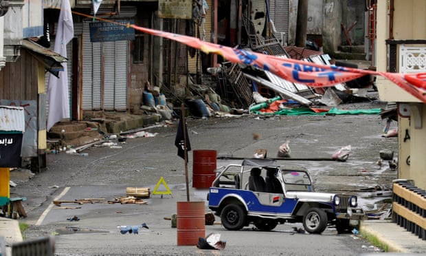 A view of the Maute group stronghold with an ISIS flag in Marawi City in southern Philippines.