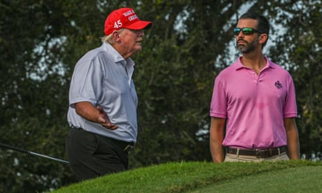 Donald Trump, Jr, and his father at Trump National Doral Miami golf club, 27 October 2022.