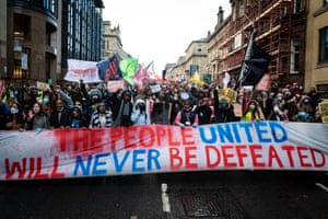 Banner reads: The people united will never be defeated