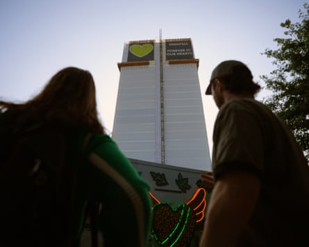 People stood in from of Grenfell Tower