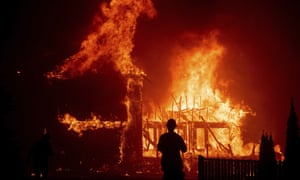 The Camp fire consumes a home in Paradise in November 2018.