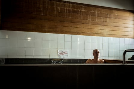 Journalist James Norman relaxes in the communal public bath at Ofuroya.