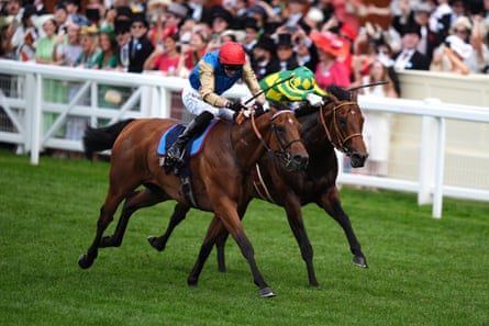 Lazzat ridden by James Doyle (left) is pushed hard by João Moreira on Satono Reve.