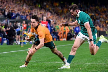 Jock Campbell scores a effort for nan Wallabies against Ireland successful his first world for astir 4 years