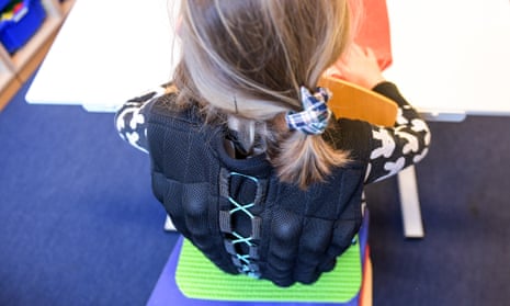 Nine-year-old Nina wears a sand-filled vest at school in Hamburg.