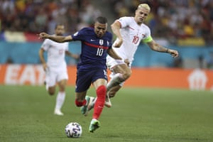 France’s Kylian Mbappe, left, fights for the ball with Switzerland’s Granit Xhaka.