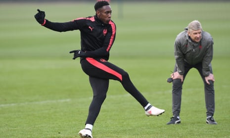 Danny Welbeck, the only experienced striker in the Arsenal squad, gets some shooting practice under the watchful eye of Arsène Wenger at London Colney on Wednesday.