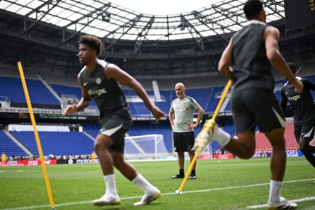 Enzo Maresca watches his Chelsea side train before the Club World Cup final
