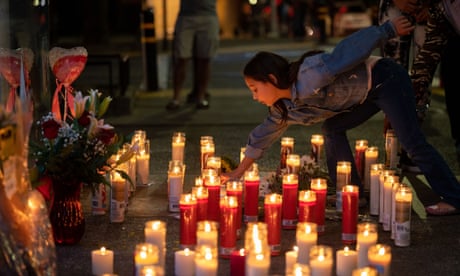 California News, Sacramento, CA, USA - 04 Apr 2022<br>Mandatory Credit: Photo by Paul Kitagaki Jr/ZUMA Press Wire/REX/Shutterstock (12883098m) Sergio Harrisâ€s family member, Calista Smith, light candles at a memorial in Sacramento, Monday, April 4, 2022, for Sergio Harris who was killed during Sunday morningâ€s mass shooting at 10th and K Streets. The mass shooting claimed six people dead and twelve injured during the worst shooting this year in Sacramento. California News, Sacramento, CA, USA - 04 Apr 2022