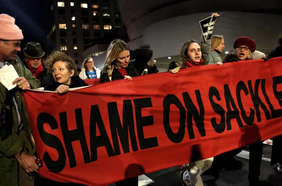 Photographer Nan Goldin leads a protest out of the Guggenheim Museum in Manhattan, New York, against its funding by the Sackler family, the owners of Oxycontin manufacturer Purdue.