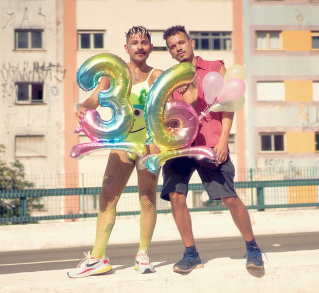 Vagner Nascimento and Leandro Pinho pose for a portrait at the Minhocão Viaduct in São Paulo, Brazil