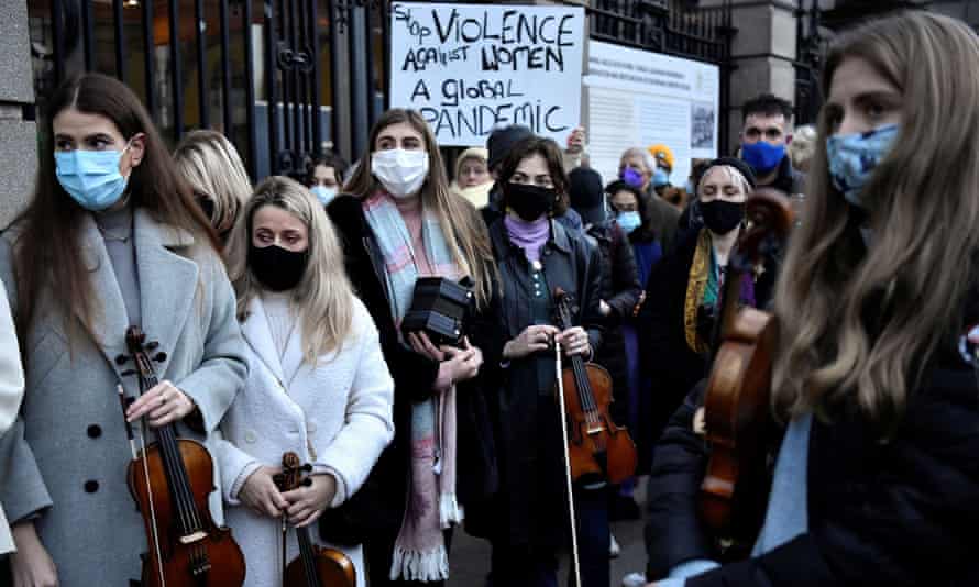 Musicians at a memorial for Ashling Murphy outside the government buildings in Dublin