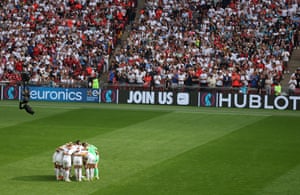 England players form a huddle prior to kick off.