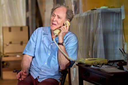 Movie still of John Lithgow on a landline
