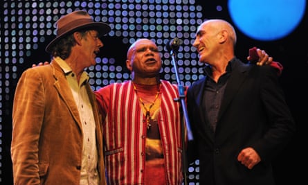 L-R: Shane Howard, Archie Roach and Paul Kelly perform at The Domain in Sydney for a tribute concert to Ruby Hunter in January 2011.