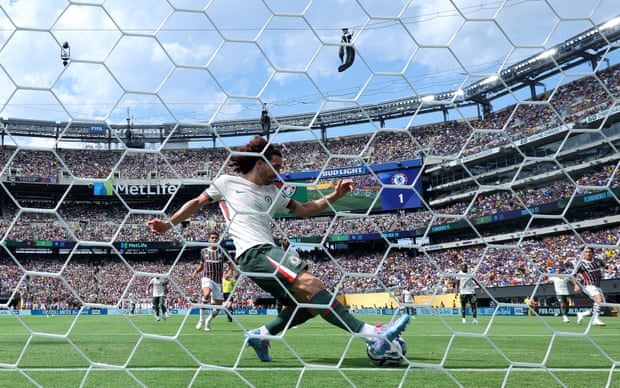 Marc Cucurella clears off the line in 35C heat. Photograph: Héctor Vivas/FIFA/Getty Images