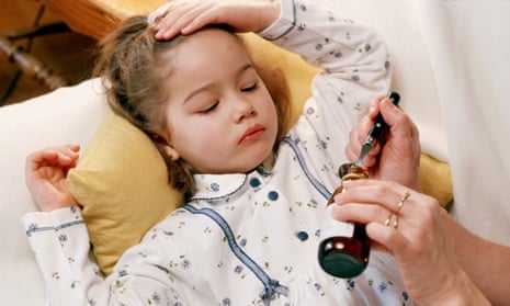 An ill child receives medicine