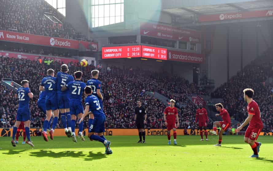 Trent Alexander-Arnold shoots at goal from a free kick.