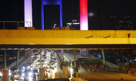 Turkish soldiers block the Bosporus Bridge in Istanbul preventing cars leaving the Asian side of the river.