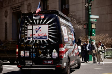 A supporter of former US president Donald Trump drives a van outside Manhattan criminal court on the second day of Trump’s trial for allegedly covering up hush money payments linked to extramarital affairs in New York on April 16, 2024.
