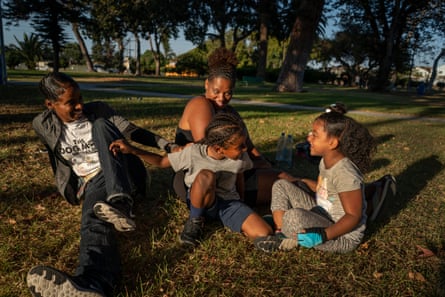 Cherokeena Robinson, 32, and her sister Lina Robinson, 34, meet at the park in Torrance, California almost every day to let their kids play together.