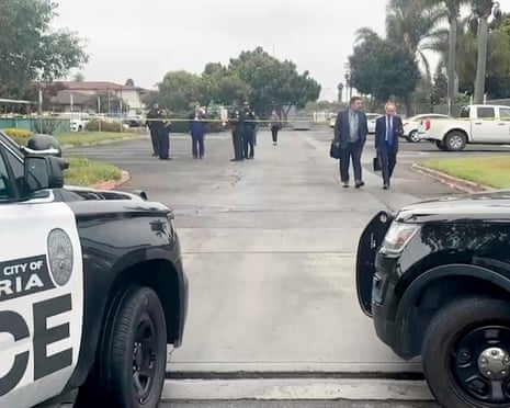 Police block a courthouse parking lot with crime tape following an explosion